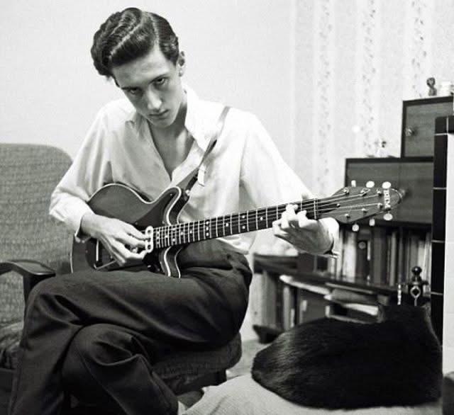 A young Brian May and his father, Harold, completing the construction of the Red Special in their family workshop in 1963