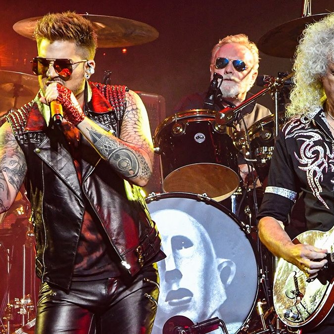 Queen + Adam Lambert on stage during The Rhapsody Tour